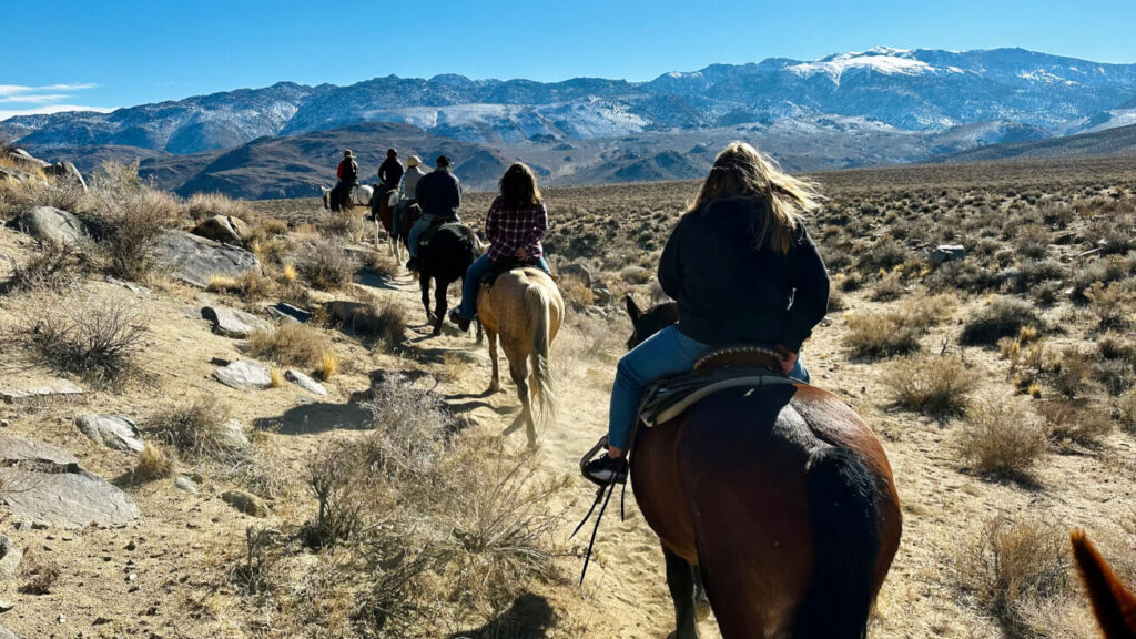 On the trail in Buttermilk Country near Bishop; a horseback ride in early winter.