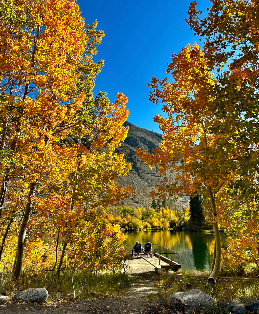 Accessible fishing pier at Intake 2 reservoir in Bishop Creek Canyon in fall.